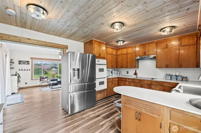 The cutest and most functional farmhouse kitchen with solid wood cabinets hand crafted by a local cabinet maker
