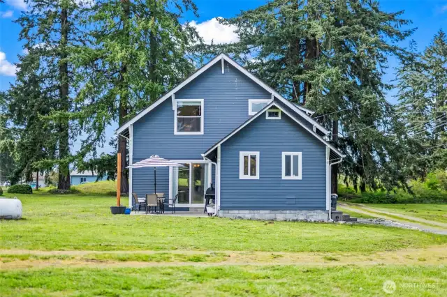 View of the back of the cutest farmhouse EVER!