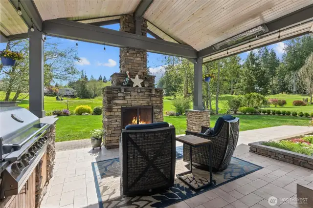 Your own private oasis! Vaulted T&G ceiling, stacked stone fireplace and built-in BBQ with honed granite countertops!