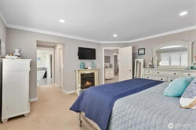 Primary bedroom with ensuite and two closets.