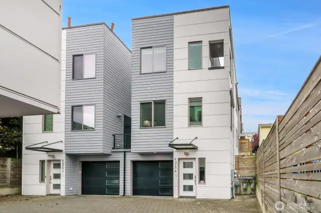 Modern duplex styled townhouse/rowhouse with easy access private garage parking
