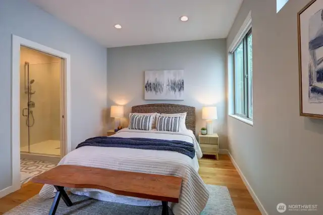 Primary suite features luxurious 3/4 bath