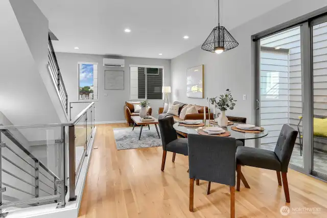 Open concept living & dining area!! Dining with sliding glass door to private balcony
