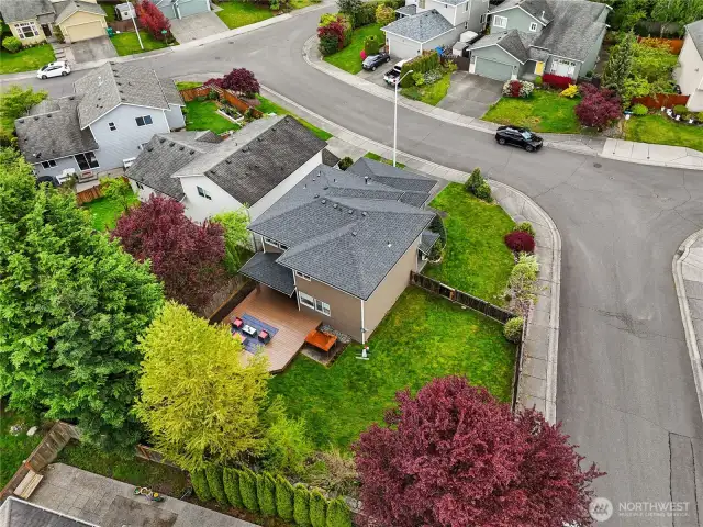 Stunning bird's-eye view of the property, showcasing the spacious yard and prime location