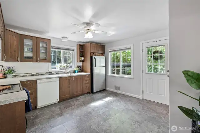 KITCHEN AND BACK DOOR. ALSO ACCESS TO BASEMENT