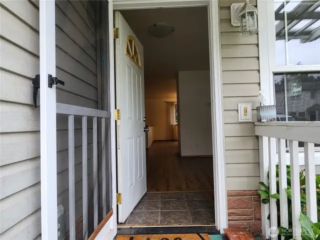 Entering the home you have a tile entrance, then easy to clean vinyl plank flooring. Living room with gas fireplace is upon entering and kitchen and dining room are straight ahead.