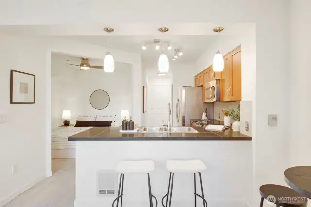 Recent updates include fresh designer paint, new carpet, appliances and lighting.