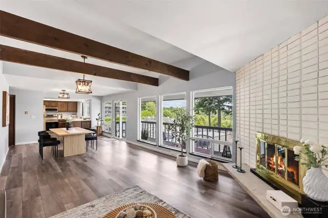 View from living area, into dining and kitchen.