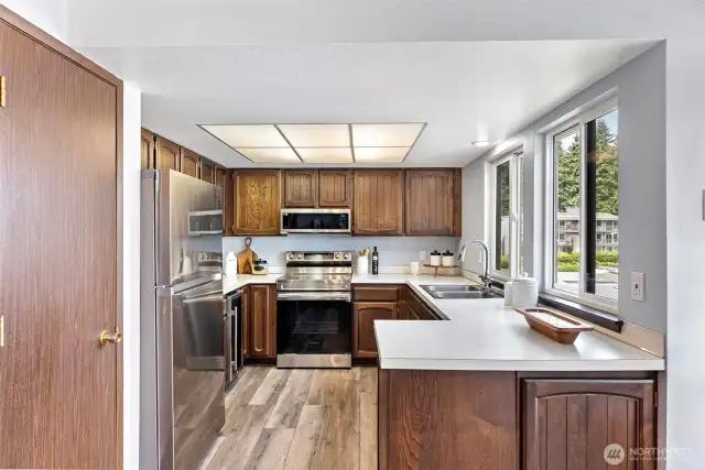 Kitchen, newer appliances and wine fridge.
