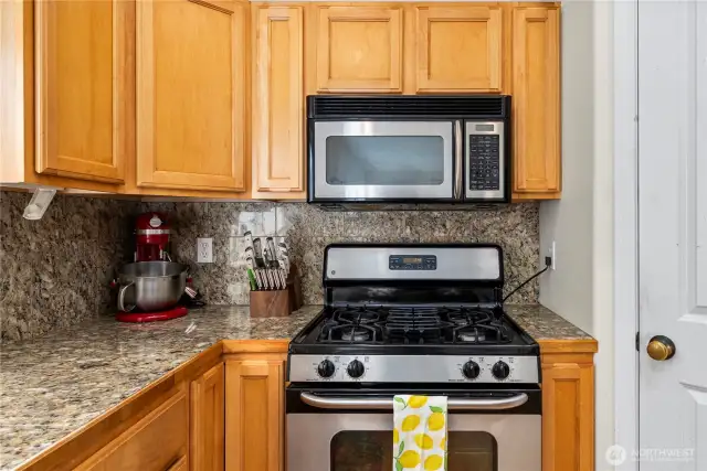 Kitchen with ample cabinet storage & counter space