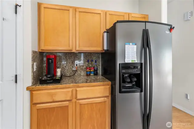 Kitchen with ample cabinet storage & counter space