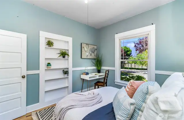 Built in closets and shelving provide ample storage.