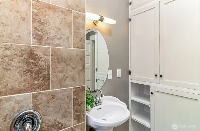 Wall of storage in the bathroom also.