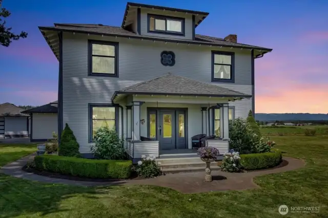 Beautiful entry with beveled glass door and sidelights.