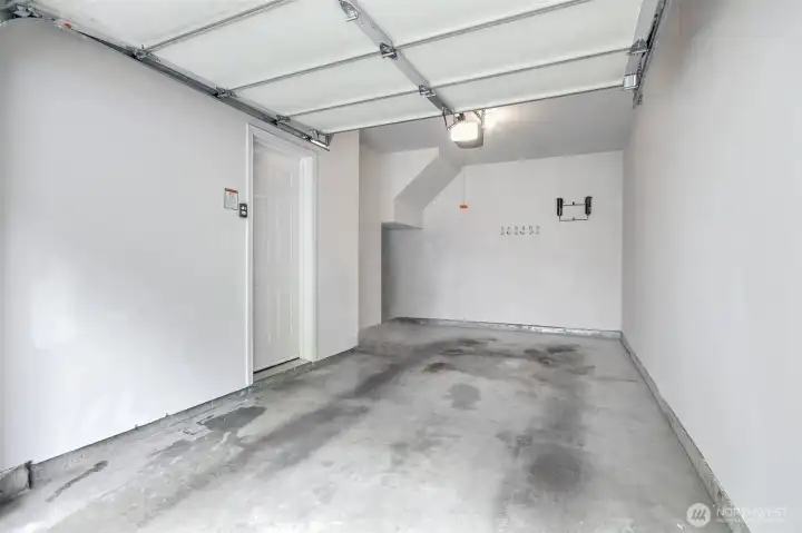 Attached one car garage with space for storage with door that opens up to inside your condo.