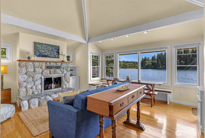 Never get tired of this view, seen from almost every room in the house! Stay cozy by the wood-burning fireplace during those winter months.