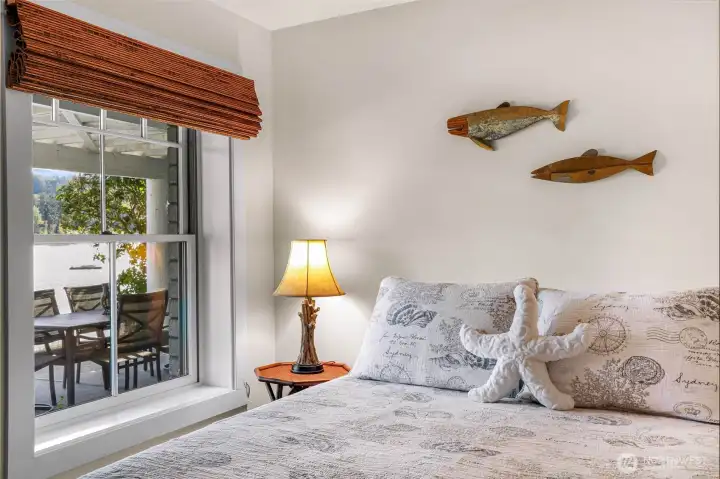 Downstairs second bedroom with a view of the bay.
