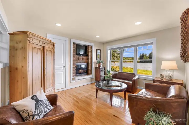 This is the downstairs flex-room which has a wood burning fireplace and a closet too.  This could also be used as a guest bedroom/ office/ or craft area.