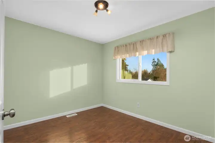 One of 2 additional bedrooms on the main floor