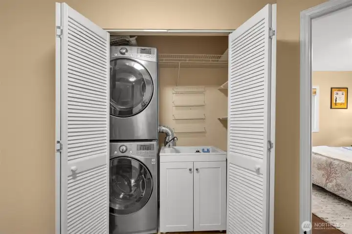 Lower level laundry with the sink