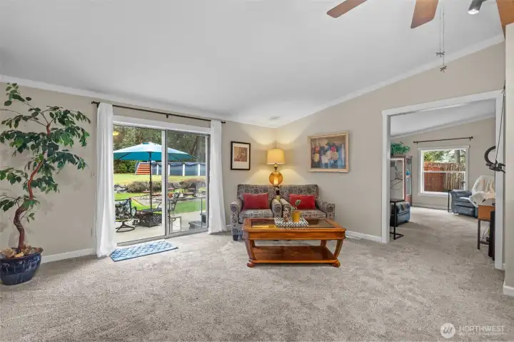 Sliding door leads to large backyard patio.