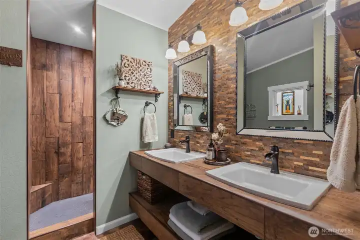 Updated ensuite feels like a luxury spa! High end finishes and fixtures really elevate this space