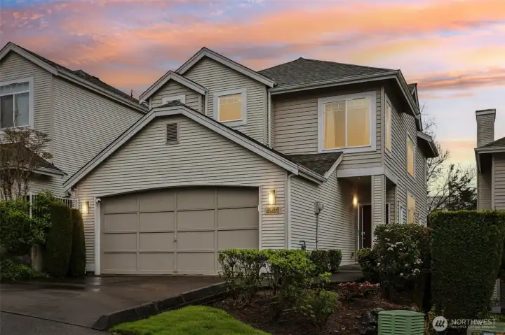 Evening ambiance highlights the home’s charm and welcoming glow