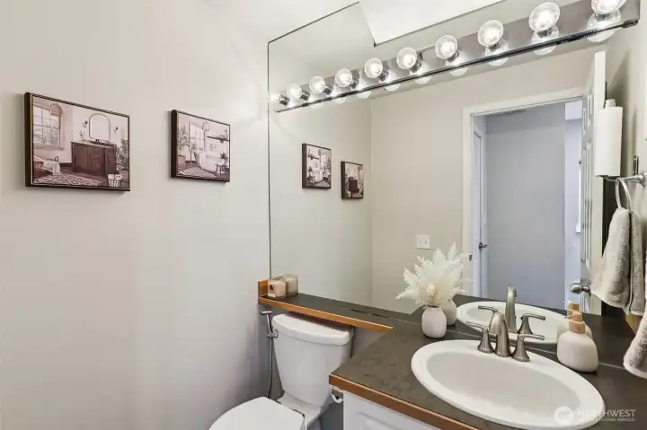 Practical main floor powder room for visitors and daily use