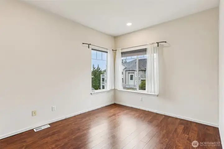 Bright secondary bedroom with great natural light and a functional layout
