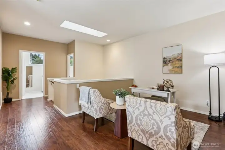 Versatile loft space perfect for a home office, reading nook, or additional living area