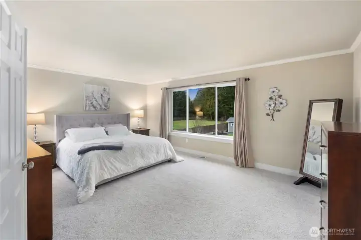 Window faces North with lovely views of the backyard and gorgeous treeline.