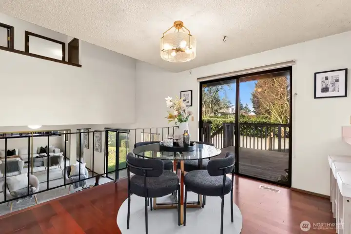 Another view of dining space, looking down to second living area.