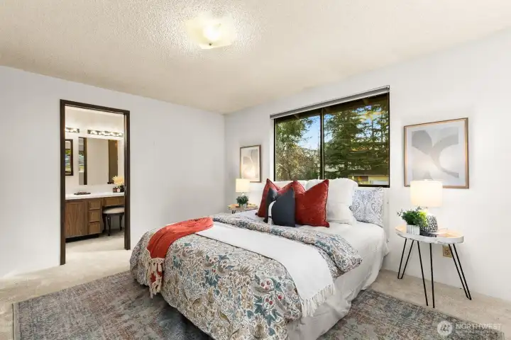 Primary bedroom offers private ensuite.