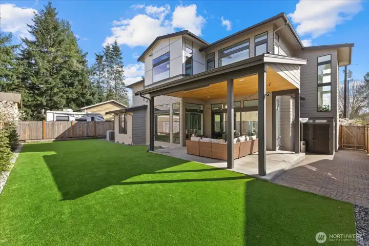 With its striking architectural profile, manicured approach, and modern curb appeal, this residence makes an unforgettable statement from the moment you arrive.