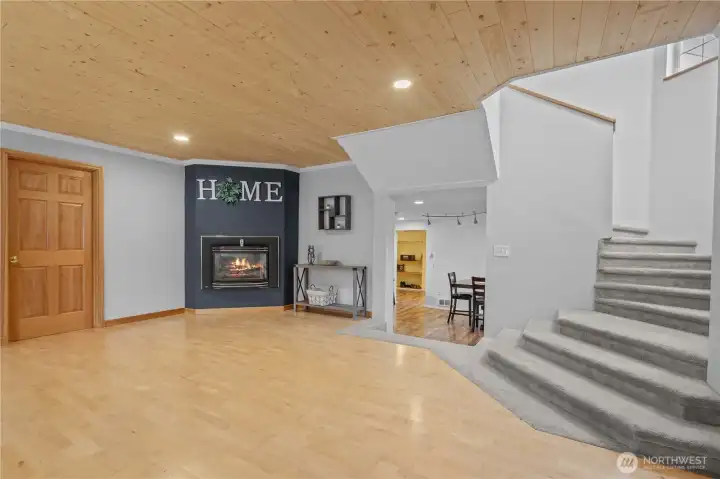 Spacious living area with vaulted ceilings and open layout, creating a seamless flow for modern farmhouse living in Montesano.