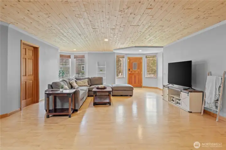 Open-concept living space with flexible layout options—perfect for multi-use living, home office setup, or gathering areas.