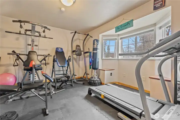 Home gym or flex bedroom space—perfect for fitness, hobbies, or guest accommodations.