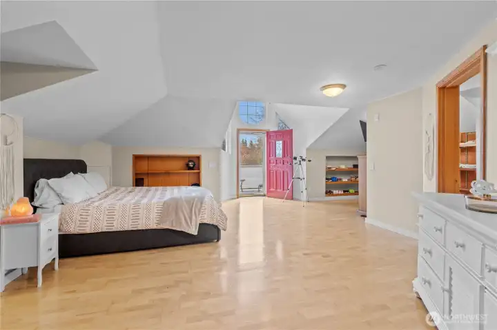 Spacious primary suite with vaulted ceilings and open layout—your private retreat in this Montesano farmhouse.