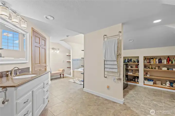 Large bathroom with extended vanity and storage—perfect for busy households.