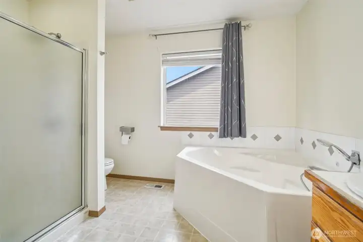 Primary bathroom with soaking tub.