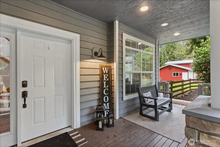 A closer look at the front porch highlights the thoughtful details and inviting atmosphere of the entry.