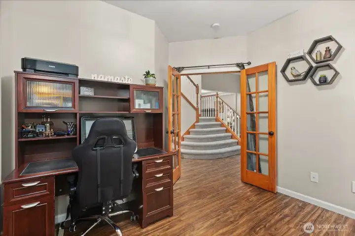 French doors add character and separation, allowing this space to function privately while still feeling connected to the home.