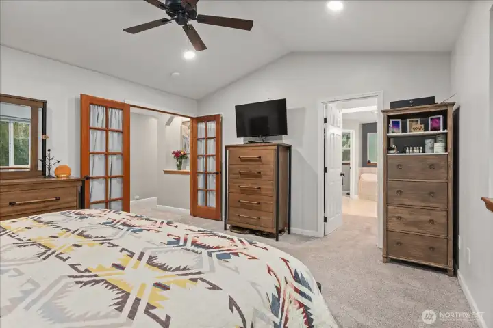 The primary suite connects to a spacious 5-piece ensuite, offering a private setting with room to unwind and reset.