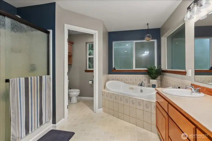 Relax and unwind in the jetted soaking tub—your own private, spa-like retreat within the primary suite.