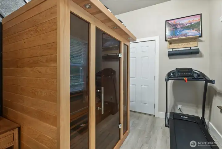 Versatile bonus space located off the third garage bay—ideal for a home gym, hobby room, or additional workspace.