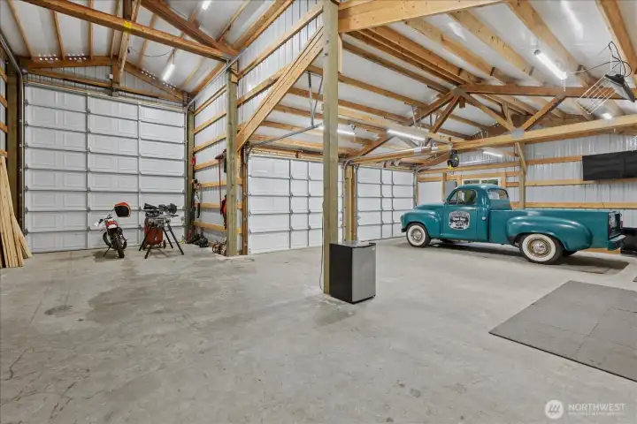 24x24 detached shop with soaring ceilings and an attached 14x36 RV bay.