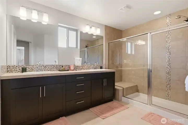 Primary en suite with double sinks and walk in shower