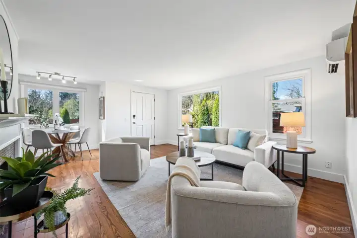Solid hardwood flooring throughout.
