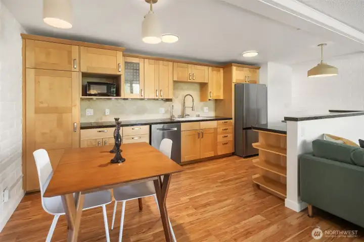 Ample cabinets + display shelves provide great storage.