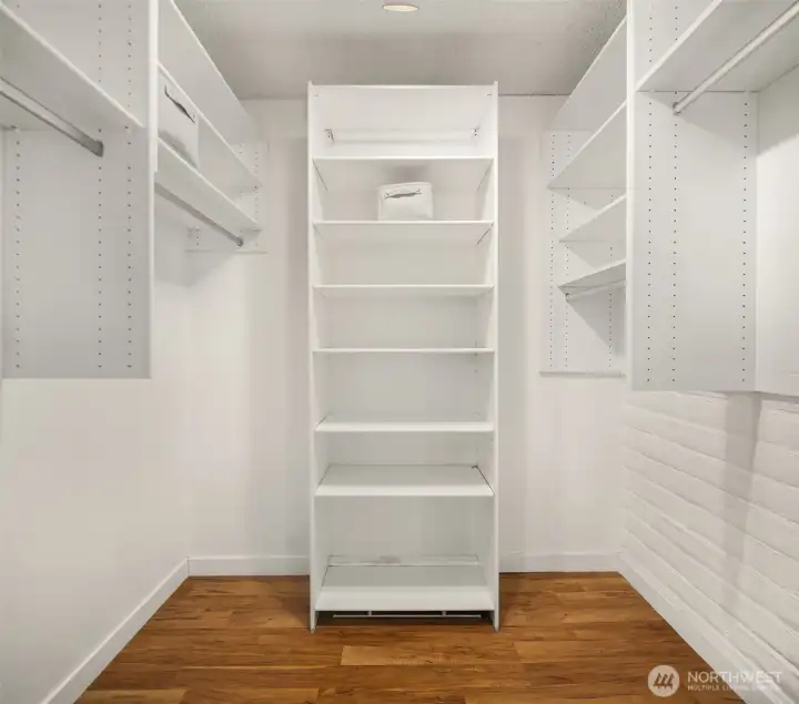 Walk-in closet with custom organizers, too!